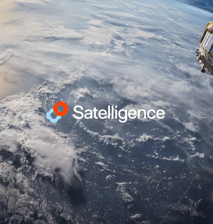 Photo of a satellite hovering above Earth, capturing a vast expanse of clouds and ocean. The logo "Satelligence" with a logo is overlayed, conveying innovation.